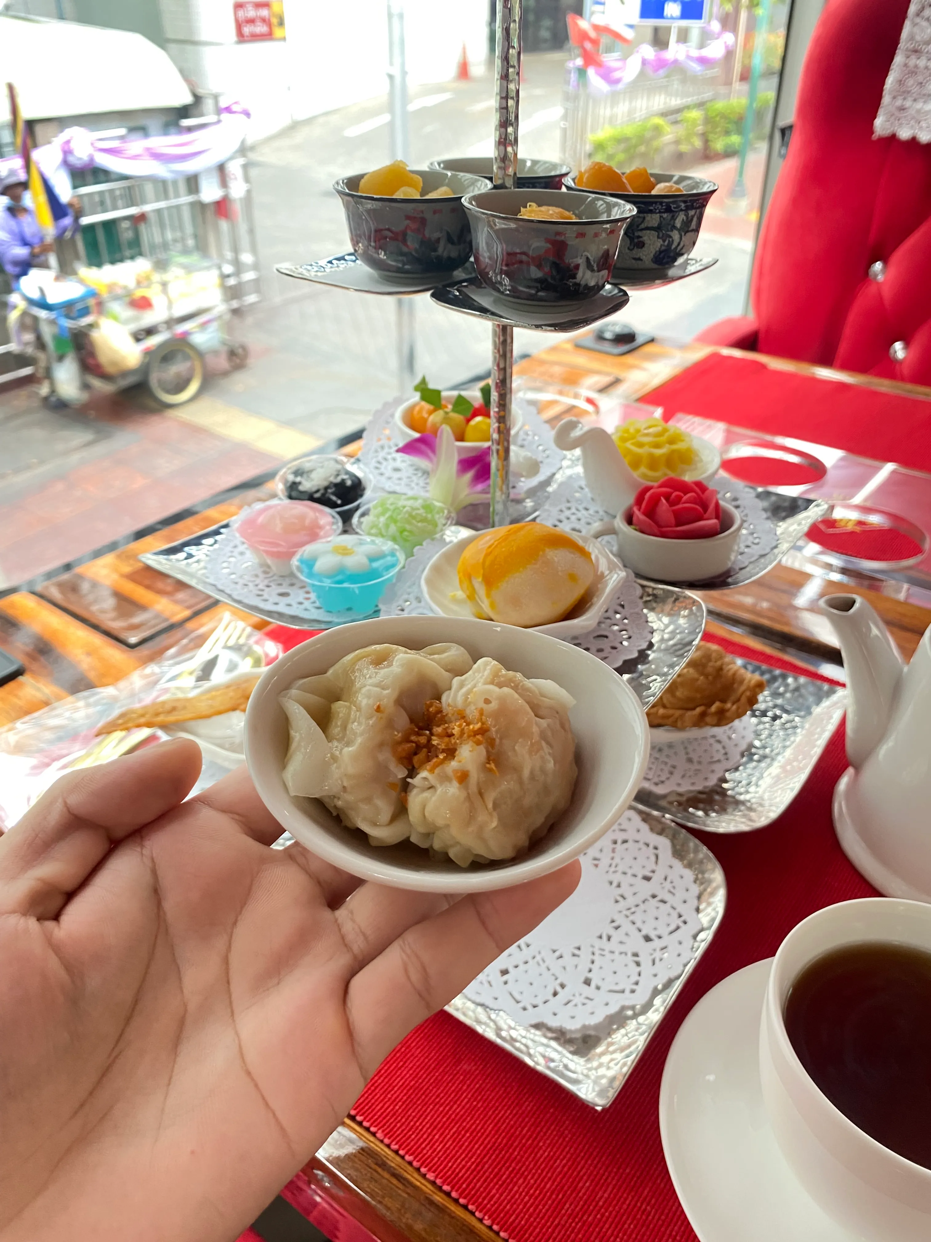 Overhead view of elegant dishes and table setting during meal service inside bus